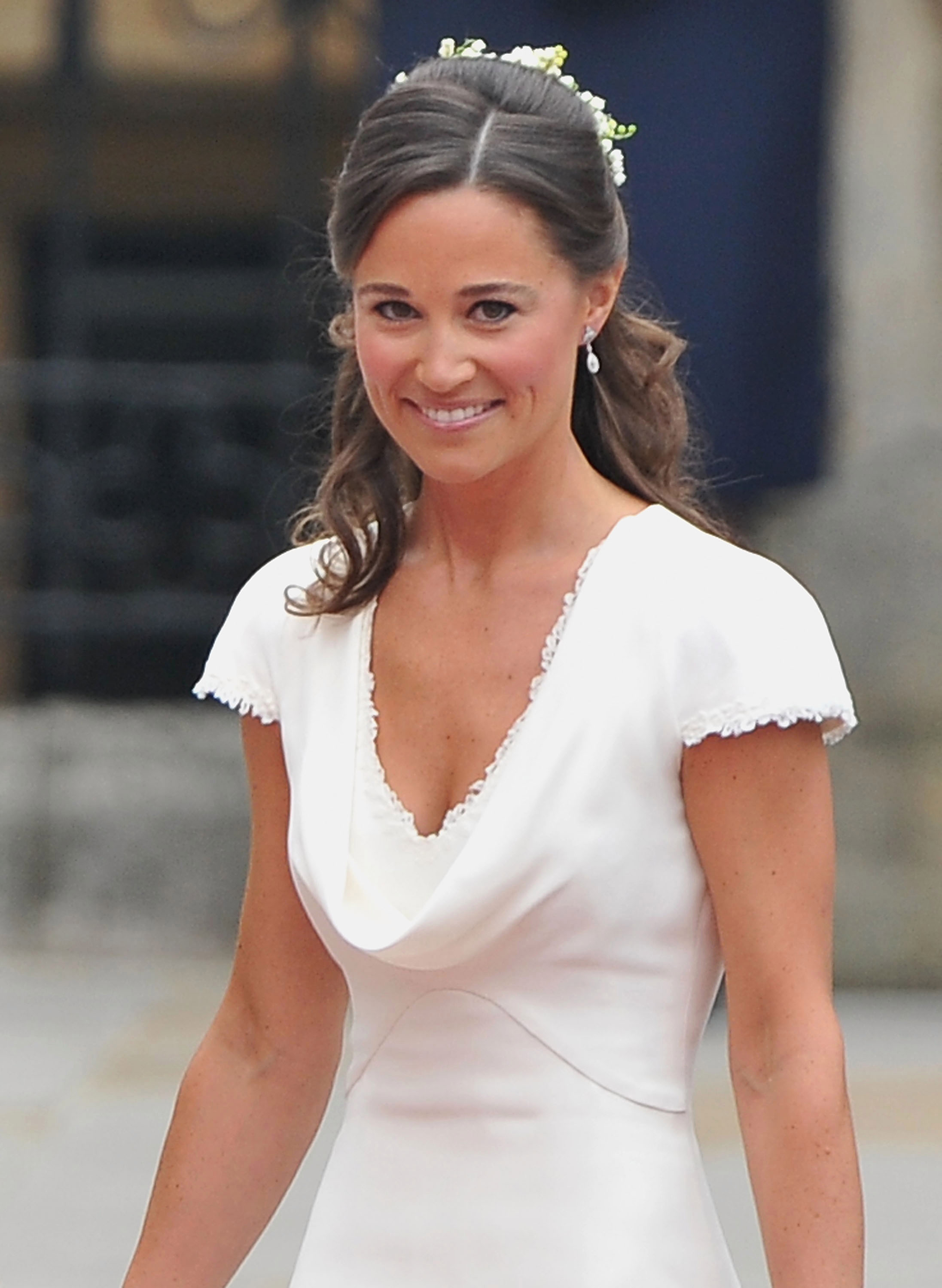 皮帕·米德尔顿（Pippa Middleton）在2011年姐姐的婚礼上合照